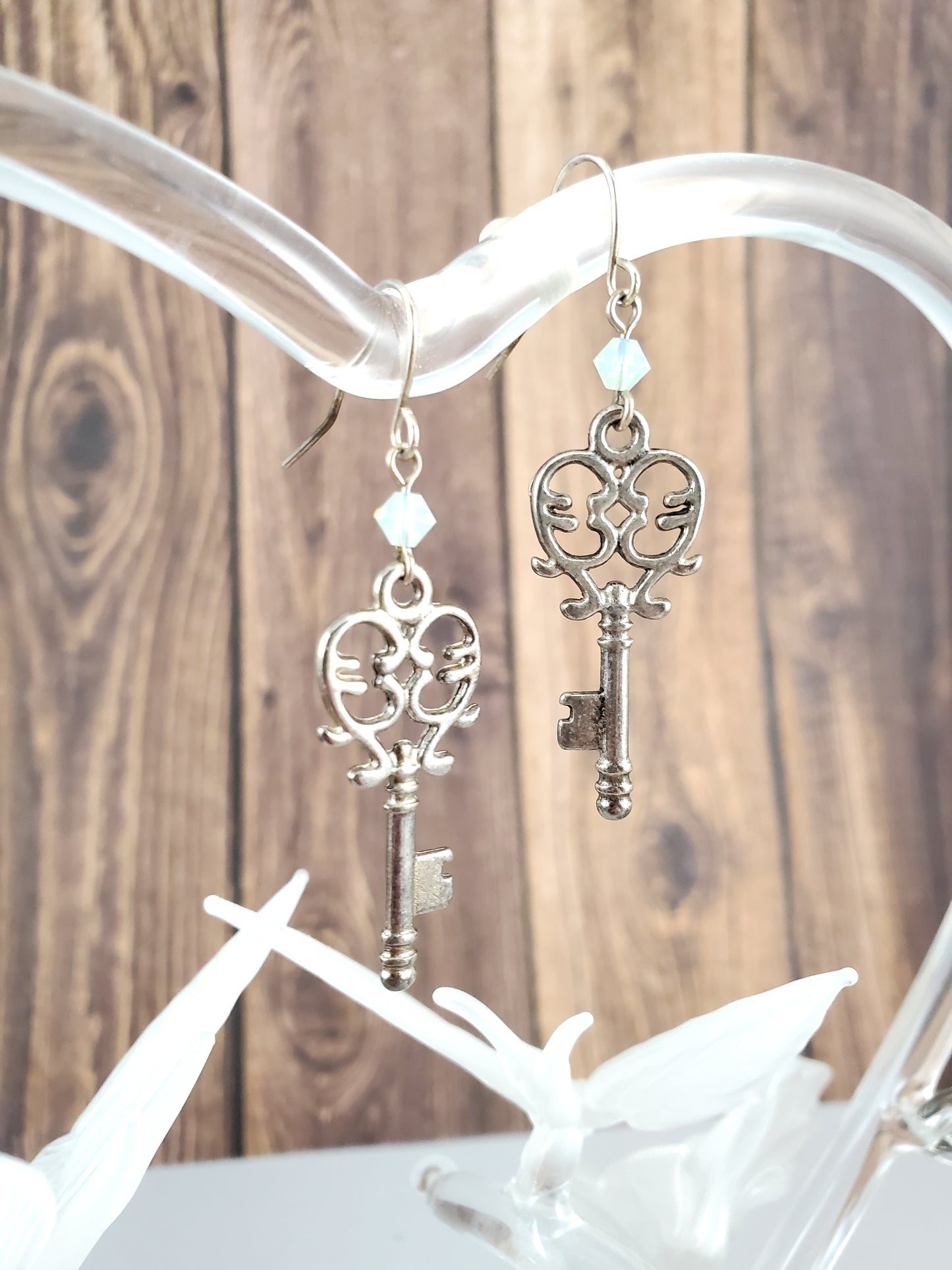 Silver Openwork Key Earrings with Chrysolite Opal Green Crystals