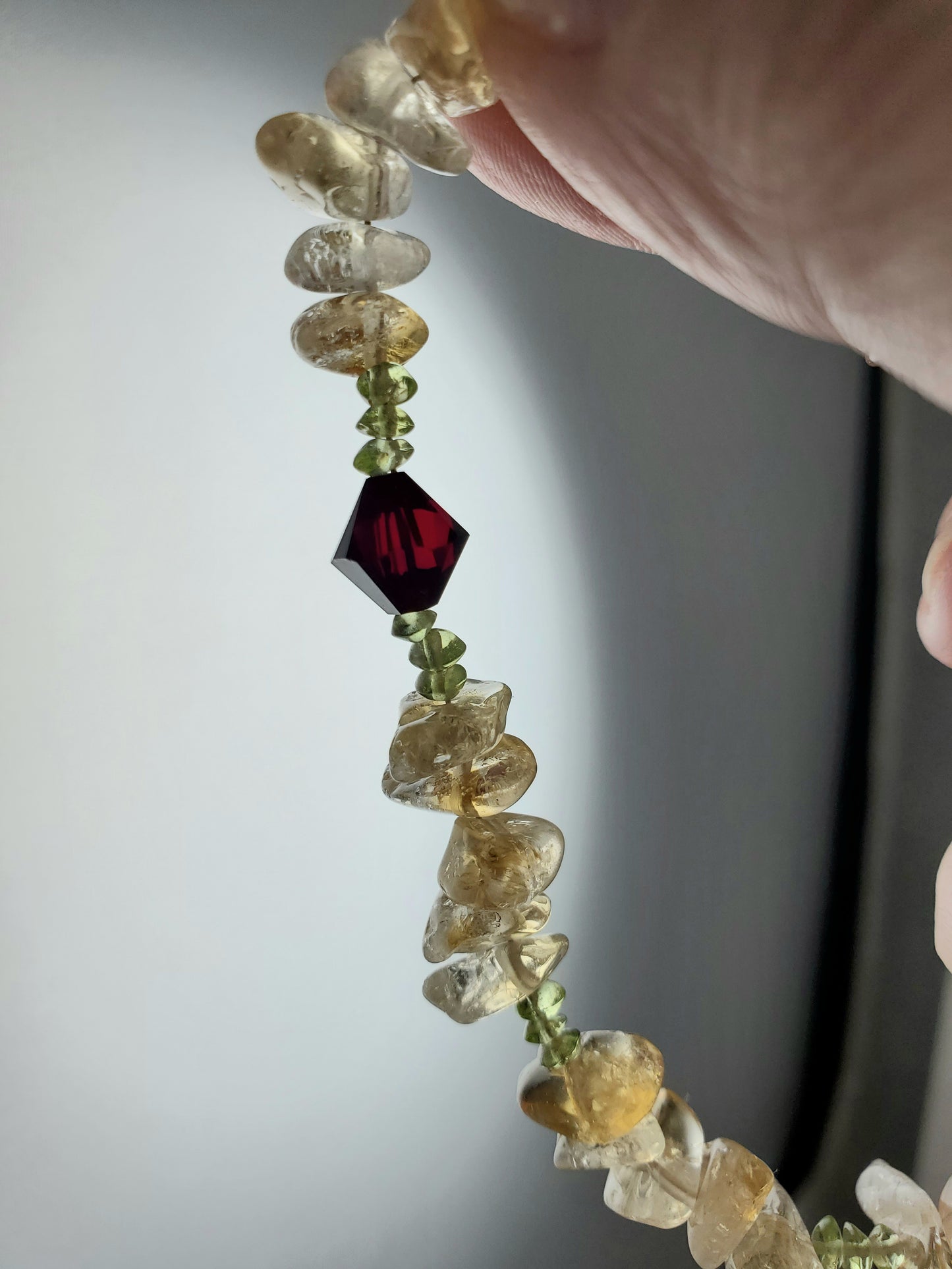 Peridot and Citrine bracelet with Ruby Red Swarovski Accent