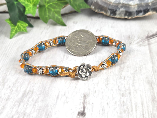 Blue, Orange, and Silver Leather Bracelet with Flower Button Closure