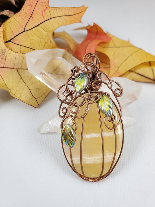 Tall Striped Orange Pumpkin Pendant with Metallic Leaves