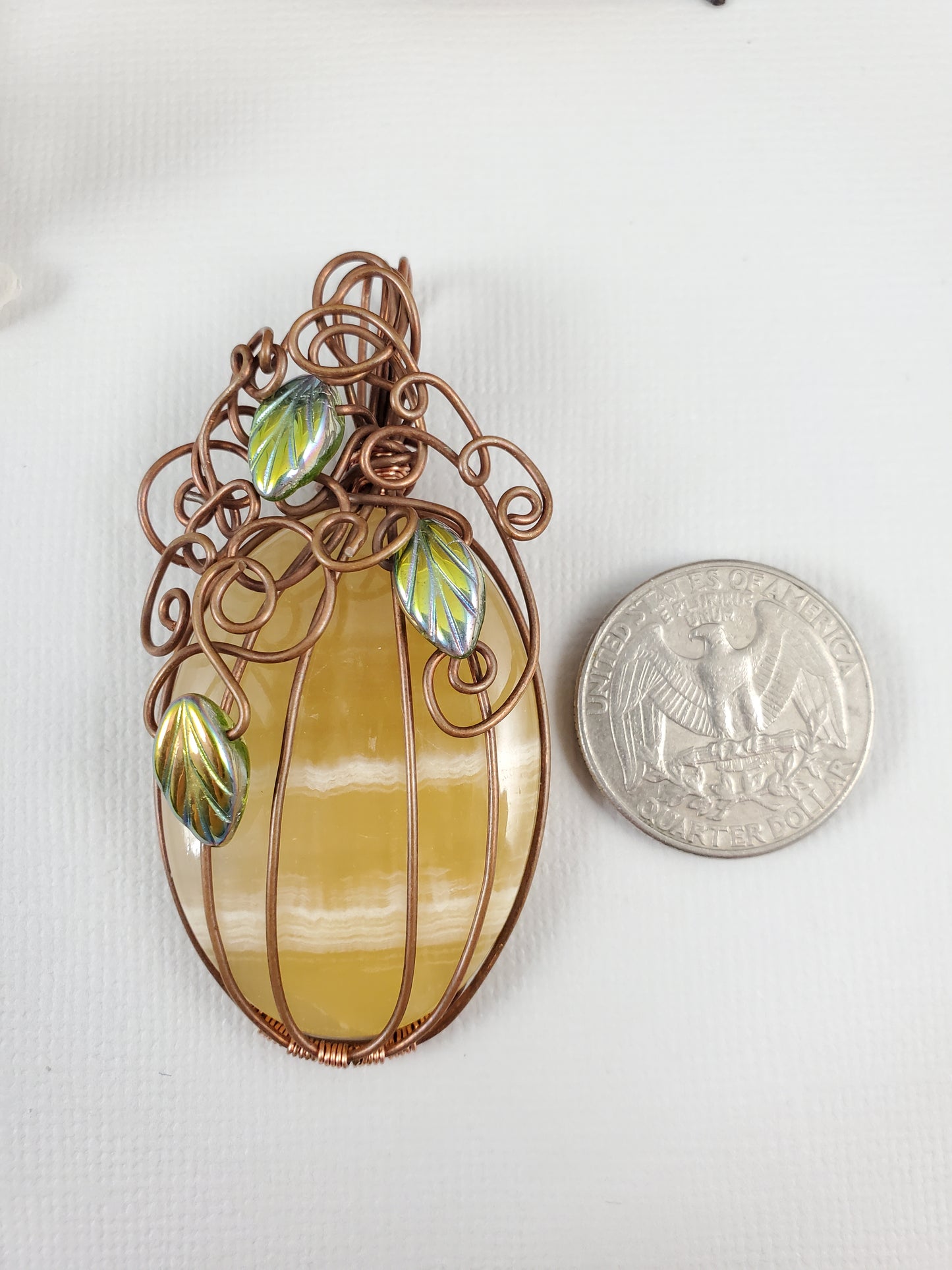 Tall Striped Orange Pumpkin Pendant with Metallic Leaves