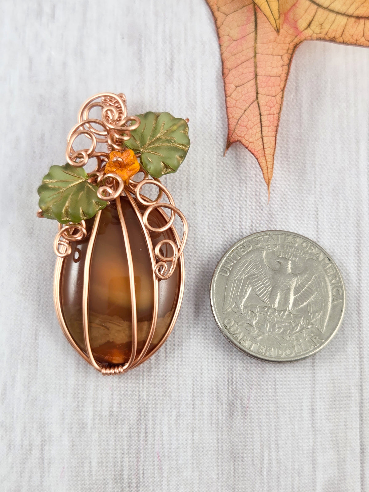 Brown Jasper Pumpkin with Bright Green Leaves