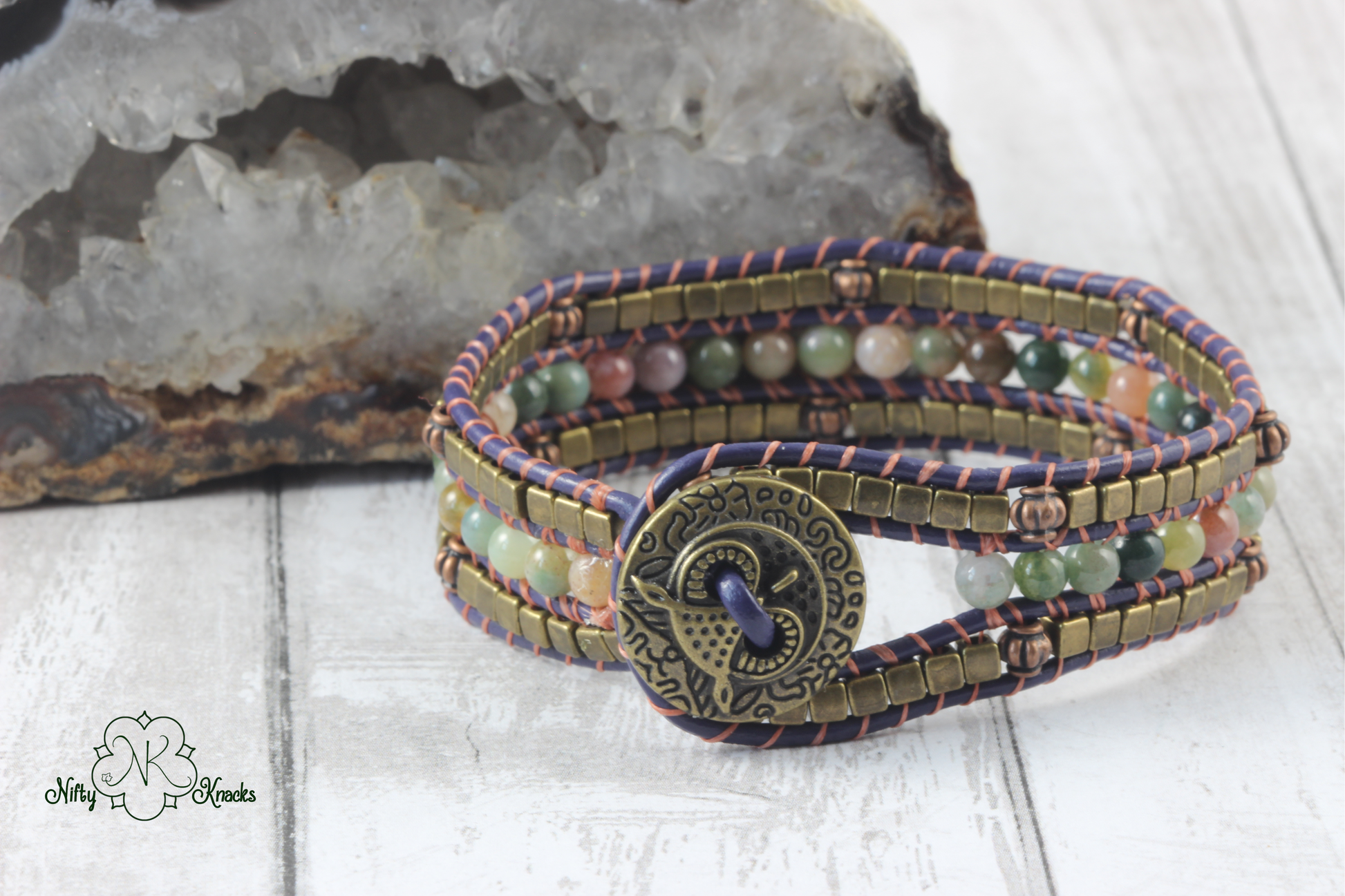 Genuine fancy jasper woven with Nymo thread over purple genuine leather cord, antique gold- and antique copper-tone beads (unknown metal).  Textured and raised owl button and loop closure (unknown metal).  inner diameter: 7 inches (average)  width: 3/4 inches